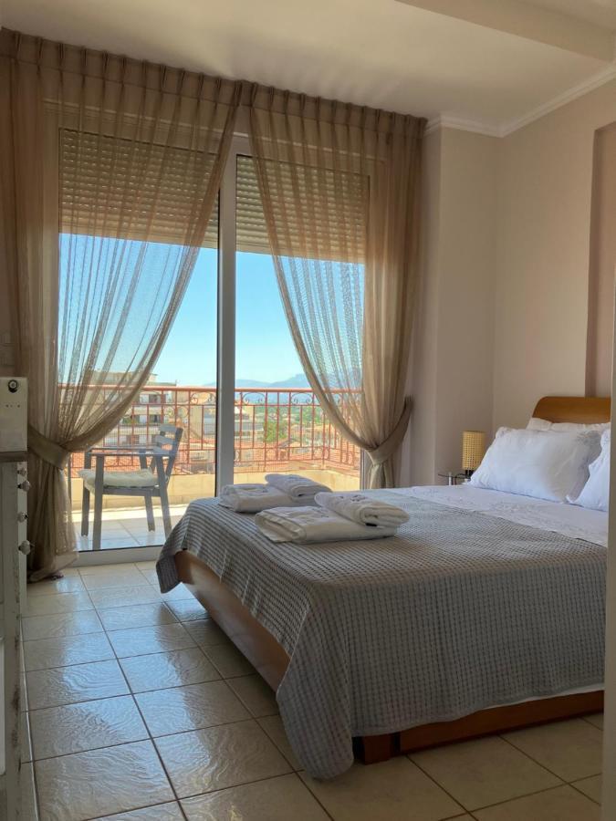 Blue Jasmine Apartment Aigio Bagian luar foto